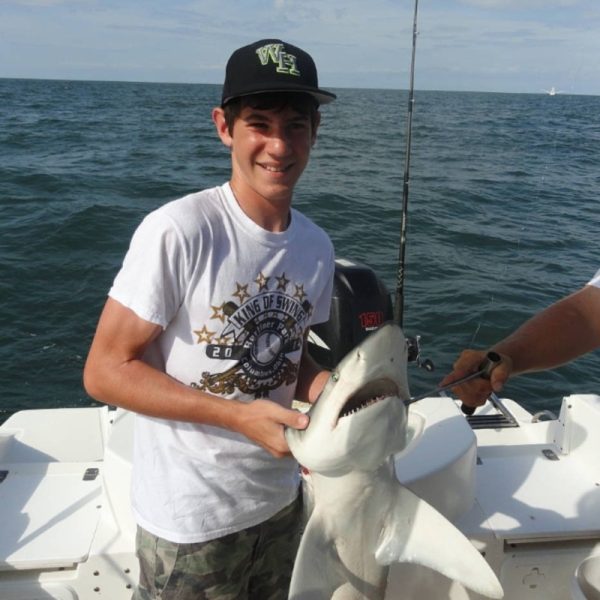 Top Rated Fishing Charters In Myrtle Beach 17 Shark fishing charter in Myrtle Beach landing a blacktip shark during a guided trip
